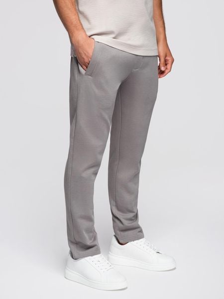 Męskie dresowe spodnie z nogawką bez ściągacza - szare V8 - Rozmiar: XL. Szare spodnie dresowe męskie Ombre Clothing, bez wzorów, z bawełny. Za 169.99 zł.