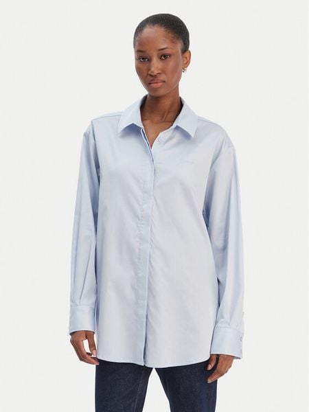 Guess Koszula W6RH57 WAF10 Błękitny Oversize. Niebieskie koszule damskie Guess, xl, z aplikacjami, z bawełny, bez kołnierzyka, bez ramiączek. Za 399.99 zł.