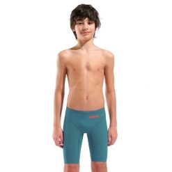 Spodenki startowe pływackie Arena Powerskin IMPULSO Jammer Junior. Niebieskie kąpielówki męskie Arena, bez wzorów, sportowe. Za 399.99 zł.