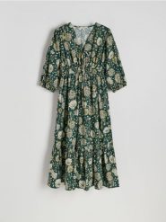 Wzorzysta sukienka z bawełny - wielobarwny. Sukienki damskie Reserved, l, bez wzorów, z bawełny, bez kołnierzyka, bez ramiączek, midi, rozkloszowane. Za 239.99 zł.