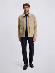 Pierre Cardin Spodnie w kolorze granatowym rozmiar: W32/L32. Niebieskie spodnie materiałowe męskie Pierre Cardin, z aplikacjami, z materiału, klasyczne. Za 139.95 zł.