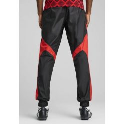 Męskie spodnie przedmeczowe Egipt PUMA Black Red. Czarne spodnie dresowe męskie Puma, bez wzorów, z dresówki. Za 309.00 zł.