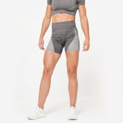 Spodenki fitness cardio damskie Domyos seamless. Czerwone spodenki sportowe damskie DOMYOS, l, z materiału, na fitness i siłownię. W wyprzedaży za 59.99 zł.