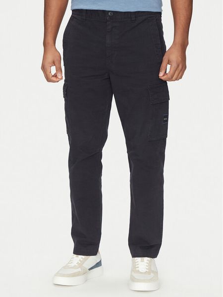 BOSS Spodnie materiałowe Sisla-8 50530599 Granatowy Regular Fit. Niebieskie spodnie materiałowe męskie Boss, bez wzorów, z bawełny. Za 579.99 zł.