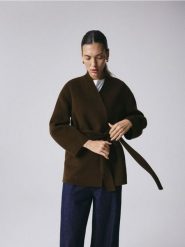 Wełniany płaszcz handmade - oliwkowy. Zielone płaszcze damskie Reserved, l, bez wzorów, z wełny. Za 499.99 zł.