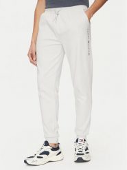 Tommy Hilfiger Spodnie dresowe UM0UM03348 Beżowy Regular Fit. Brązowe spodnie dresowe męskie Tommy Hilfiger, bez wzorów, z bawełny. Za 219.99 zł.