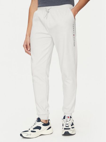 Tommy Hilfiger Spodnie dresowe UM0UM03348 Beżowy Regular Fit. Brązowe spodnie dresowe męskie Tommy Hilfiger, bez wzorów, z bawełny. Za 189.99 zł.