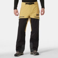 Spodnie narciarskie Helly Hansen Odin BC Infinity Shell. Brązowe spodnie materiałowe męskie Helly Hansen, bez wzorów, sportowe. Za 1,804.00 zł.
