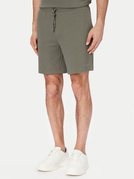 HUGO Szorty sportowe Austin 50532023 Zielony ciemny Regular Fit. Zielone szorty męskie Hugo, bez wzorów, z syntetyku, sportowe. Za 158.99 zł.