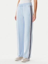 Guess Spodnie dresowe V5GB12 KCRU2 Błękitny Regular Fit. Niebieskie spodnie dresowe damskie Guess, xs, z aplikacjami, z dresówki. Za 259.99 zł.