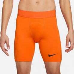 Spodnie treningowe męskie Nike Pro Drifit Strike. Brązowe spodnie materiałowe męskie Nike, bez wzorów, sportowe. Za 130.90 zł.