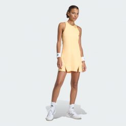 Sukienka Club Tennis Climacool. Brązowe sukienki damskie Adidas, xs, bez wzorów, sportowe, bez kołnierzyka, bez ramiączek, sportowe. Za 259.00 zł.