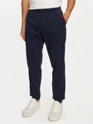 Adidas Spodnie dresowe Trefoil Essentials IY2305 Granatowy Regular Fit. Niebieskie spodnie dresowe męskie Adidas, bez wzorów, z bawełny. Za 239.99 zł.