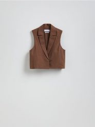 Krótka kamizelka z lnem - ciemnobrązowy. Brązowe kamizelki damskie Reserved, l, z tkaniny, krótkie. W wyprzedaży za 119.99 zł.