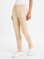 Adidas Originals spodnie do biegania Kobiety beżowy, XS. Brązowe spodnie sportowe damskie adidas Originals, xs, do biegania. Za 299.95 zł.