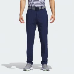 Spodnie Ultimate365 Tapered Golf. Czarne spodnie materiałowe męskie Adidas, bez wzorów, z materiału, sportowe. Za 349.00 zł.