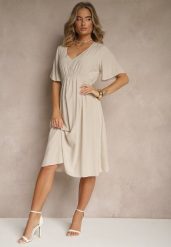 Beżowa Rozkloszowana Sukienka z Bawełnianej Tkaniny Lirioneae. Brązowe sukienki damskie Renee, na co dzień, l, bez wzorów, z bawełny, eleganckie, bez kołnierzyka, bez ramiączek, midi, rozkloszowane. W wyprzedaży za 52.49 zł.