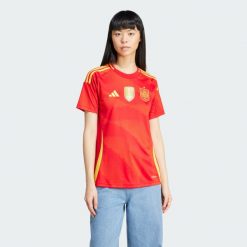 Koszulka Spain 24 Home. Czerwone bluzki damskie Adidas, s, bez wzorów, z materiału, sportowe, bez kołnierzyka, bez ramiączek. Za 449.00 zł.