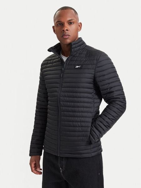 Reebok Kurtka przejściowa RCC00085 Czarny Regular Fit. Czarne kurtki męskie Reebok, m, bez wzorów, z syntetyku, bez kaptura. Za 299.99 zł.