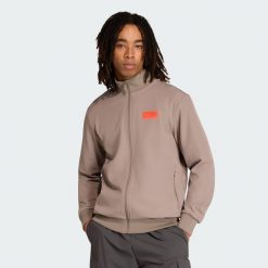 Bluza Dresowa Audi Revolut F1 Team Elevated. Brązowe bluzy bez kaptura męskie Adidas, bez wzorów, z dresówki, sportowe, bez kołnierzyka, bez ramiączek. Za 529.00 zł.