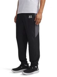 Under Armour Spodnie dresowe w kolorze czarnym rozmiar: S. Czarne spodnie dresowe męskie Under Armour, bez wzorów, z dresówki. Za 140.45 zł.