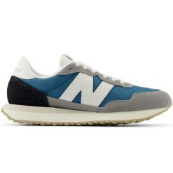 Buty sportowe New Balance MS237RTG szaro-niebieskie. Niebieskie buty sportowe na co dzień męskie z gumy, bez zapięcia. Za 451.81 zł.