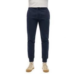 Jednolite spodnie dresowe Superdry. Niebieskie spodnie dresowe męskie Superdry., bez wzorów, z dresówki. Za 342.70 zł.