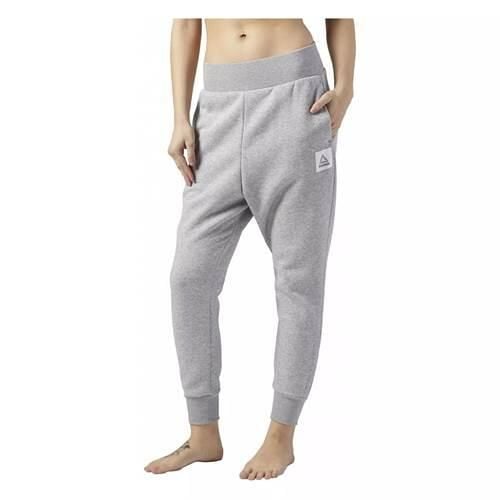Spodnie sportowe damskie Reebok Workout. Szare spodnie dresowe damskie Reebok, m, z dresówki. Za 355.00 zł.