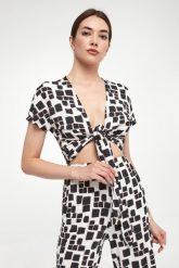 Bluzka damska MAX MARA BEACHWEAR. Bluzki damskie Max Mara Beachwear, s, bez wzorów, bez kołnierzyka, bez ramiączek. W wyprzedaży za 576.75 zł.