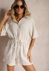 Beżowy Bawełniany Kombinezon Muślinowy Ozdobiony Troczkami Zapinany na Guziki Dlissa. Brązowe kombinezony damskie Renee, s, bez wzorów, z bawełny, eleganckie, bez kołnierzyka, bez ramiączek. Za 84.99 zł.