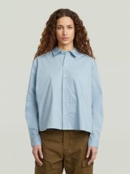 G-Star Bluzka w kolorze błękitnym rozmiar: L. Niebieskie bluzki damskie G-Star, l, bez wzorów, z bawełny, retro, bez kołnierzyka, bez ramiączek. Za 217.99 zł.