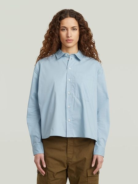 G-Star Bluzka w kolorze błękitnym rozmiar: L. Niebieskie bluzki damskie G-Star, l, bez wzorów, z bawełny, retro, bez kołnierzyka, bez ramiączek. Za 217.99 zł.