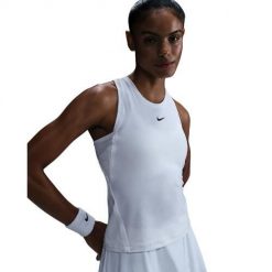 Damskie koszulka bez rękawów super gładki materiał VICTORY TANK TOP. Białe topy sportowe damskie Nike, s, bez wzorów, z materiału, bez ramiączek. Za 230.45 zł.
