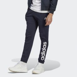 Spodnie dresowe męskie adidas Essentials Single Jersey Tapered Elasticized Cuff. Niebieskie spodnie dresowe męskie Adidas, z dresówki. Za 159.00 zł.