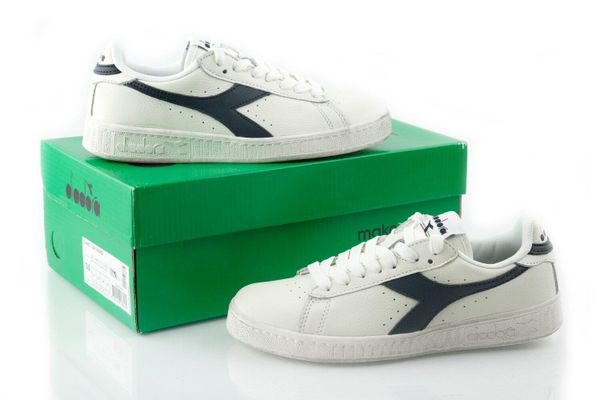 Buty sportowe Diadora Game L Low Waxed białe. Czarne buty sportowe na co dzień damskie Diadora, bez wzorów, z materiału, trekkingowe. Za 444.15 zł.