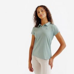 Koszulka polo z krótkim rękawem Club - zielona. Zielone bluzki damskie FOUGANZA, bez wzorów, z elastanu, bez ramiączek. Za 59.99 zł.