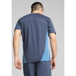 Męska koszulka treningowa Manchester City PUMA Inky Blue Magic. Niebieskie t-shirty sportowe męskie Puma, m, bez ramiączek, na fitness i siłownię. W wyprzedaży za 182.50 zł.