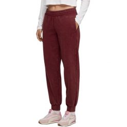 Spodnie damskie Puma ESS Elevated Comfort Wash Sweatpants. Czerwone spodnie dresowe damskie Puma, bez wzorów. Za 182.99 zł.