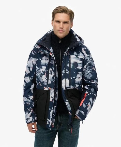 Superdry Kurtka narciarska Ultimate Freestyle — 20k wodoodporna, relaxed fit. Brązowe kurtki damskie Superdry., xl, bez wzorów, z nylonu, bez kaptura. Za 1,252.60 zł.