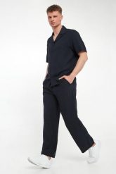 Spodnie męskie z lnem EMPORIO ARMANI SWIMWEAR. Spodnie materiałowe męskie Emporio Armani Swimwear, bez wzorów. Za 649.00 zł.