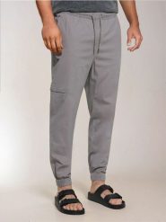 Spodnie jogger - szary. Szare spodnie materiałowe męskie Sinsay, bez wzorów. W wyprzedaży za 39.99 zł.