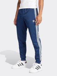 Adidas Spodnie dresowe w kolorze granatowym rozmiar: 3XL. Niebieskie spodnie dresowe męskie Adidas, bez wzorów, z dresówki. Za 149.66 zł.
