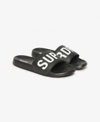 Superdry Core Pool Sliders - Klapki czarno-białe z miękkim paskiem. Czarne klapki i japonki męskie Superdry., z poliesteru. Za 197.85 zł.