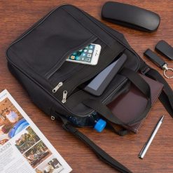 Męska torba na ramię raportówka A4 listonoszka czarna pojemna elegancka czarna F54. Czarne torby męskie na ramię bez wzorów, na ramię. Za 54.90 zł.