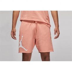 Spodnie sportowe męskie Nike Air Jordan Essentials Fleece. Czerwone spodnie sportowe męskie Nike, z bawełny. Za 324.00 zł.
