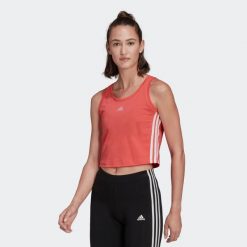 Koszulka bez rękawów damska Adidas Gym & Pilates. Brązowe bluzki sportowe damskie Adidas, l, z bawełny, bez kołnierzyka, bez ramiączek. Za 59.99 zł.