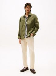 TOMMY JEANS Dżinsy - Tapered fit - w kolorze beżowym rozmiar: W33/L32. Brązowe jeansy męskie Tommy Jeans. Za 256.70 zł.