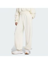 Adidas Spodnie dresowe Soft Lux JV9896 Kremowy Regular Fit. Białe spodnie dresowe damskie Adidas, xs, bez wzorów, z dresówki. Za 245.99 zł.