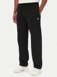 Lacoste Spodnie dresowe XH8867 Czarny Regular Fit. Czarne spodnie dresowe męskie Lacoste, bez wzorów, z bawełny. Za 594.99 zł.