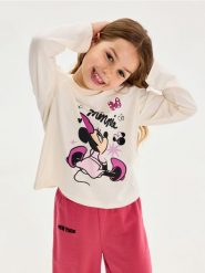 Bawełniania koszulka z nadrukiem Minnie Mouse - kremowy. Białe koszulki dziewczęce Sinsay, l, bez wzorów, z bawełny, bez ramiączek. Za 15.99 zł.